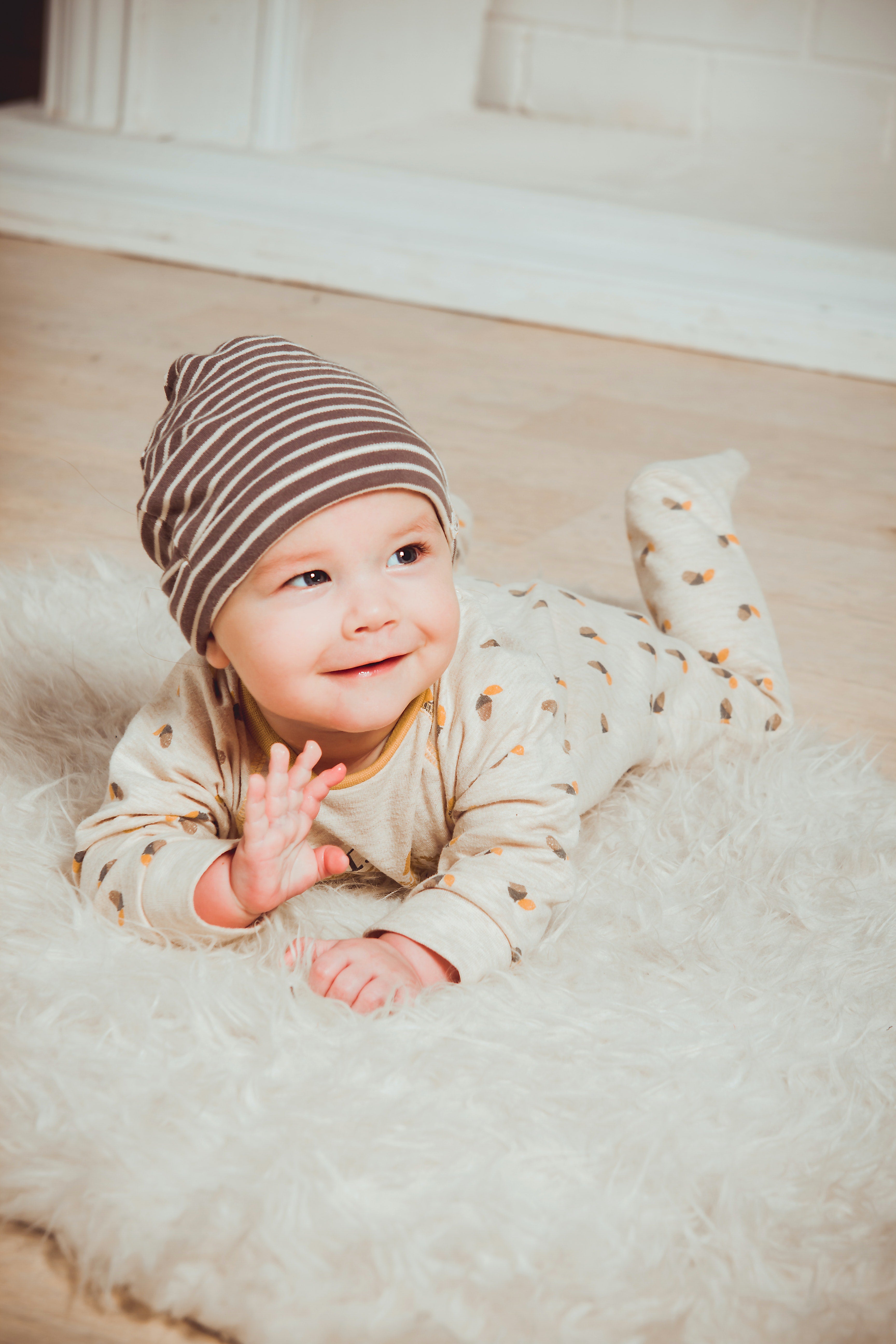 cute baby only a few months old having tummy time